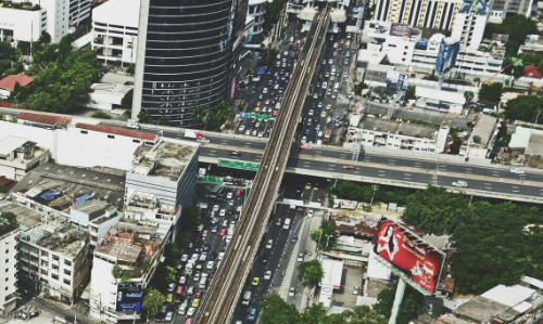 Aerial photograph of a LiDAR application in a smart city showing major trunk roads and a flyover in the middle of a city.