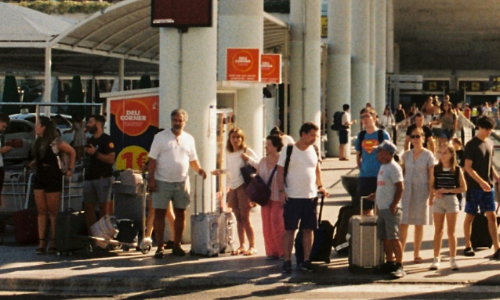 Photograph of a LiDAR application for footfall monitoring showing crowds of people entering and leaving a busy ferry terminal.
